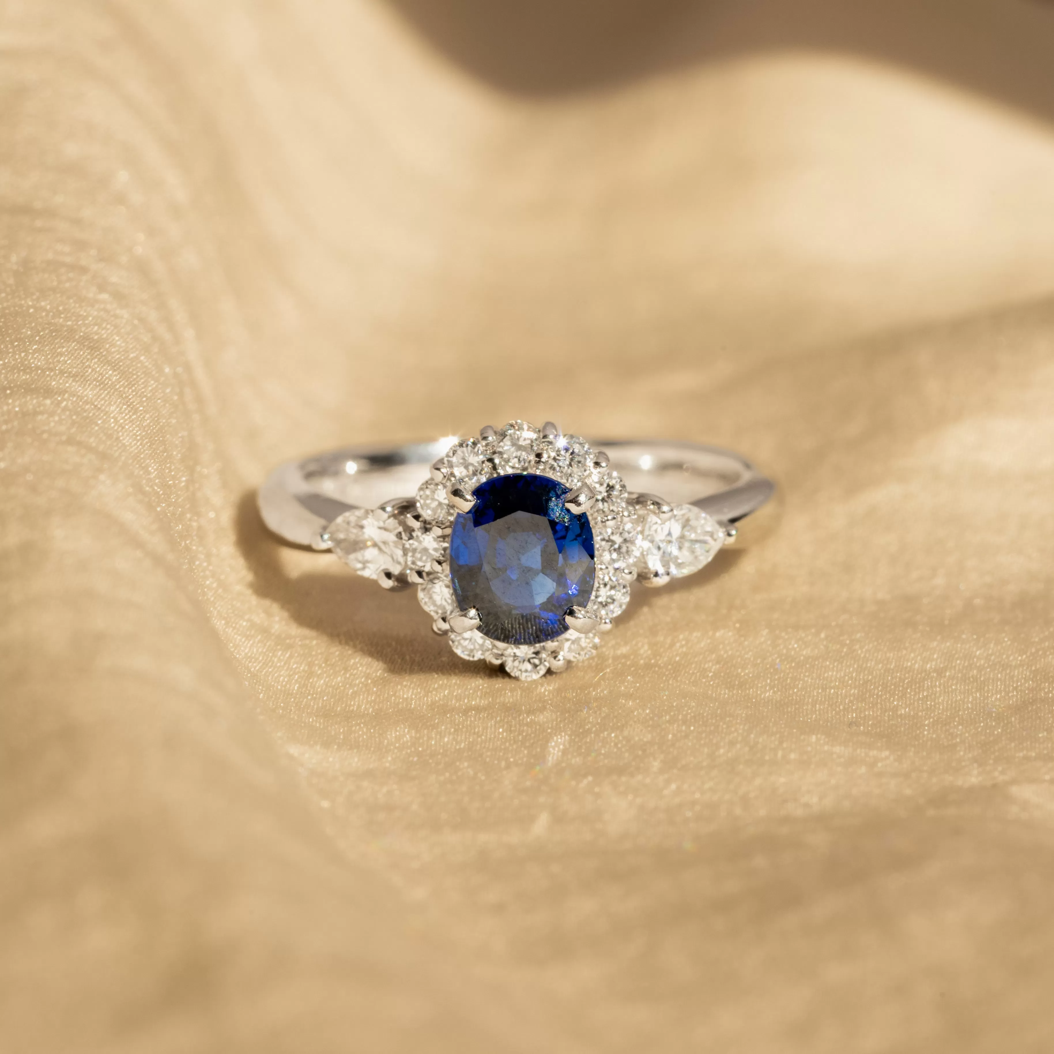 1.08 Carat Oval Natural Sapphire Diamond Halo Ring